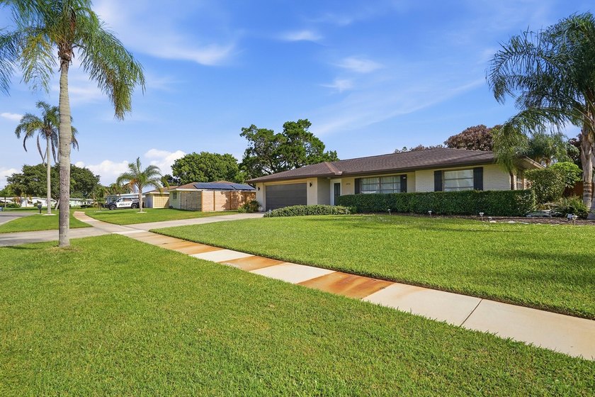 Welcome to this beautifully maintained 4-bedroom, 2-bath, 2-car - photo 46