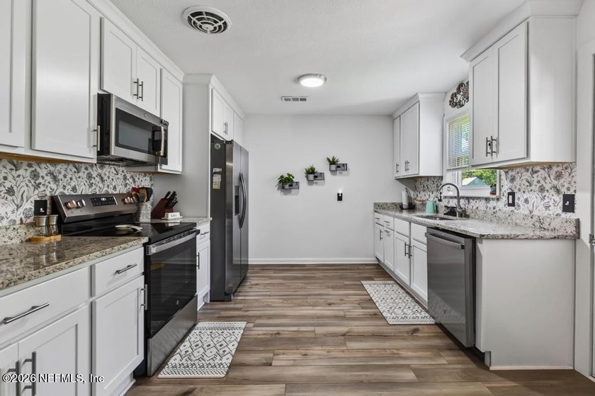Discover comfortable living in this thoughtfully updated Ortega - photo 10
