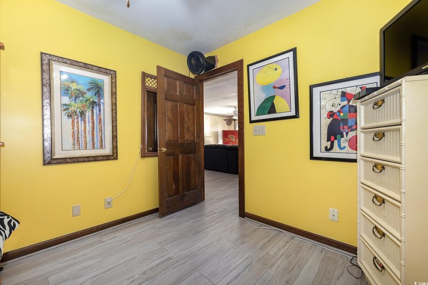 Welcome to this charming two-bedroom, two-bathroom end-unit - photo 20