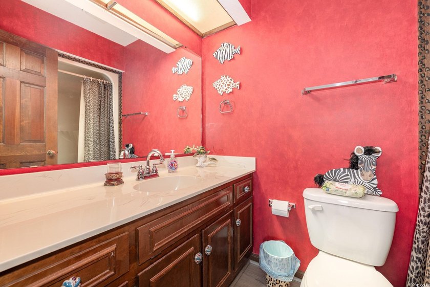 Welcome to this charming two-bedroom, two-bathroom end-unit - photo 21