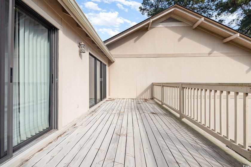 Welcome to this charming two-bedroom, two-bathroom end-unit - photo 26