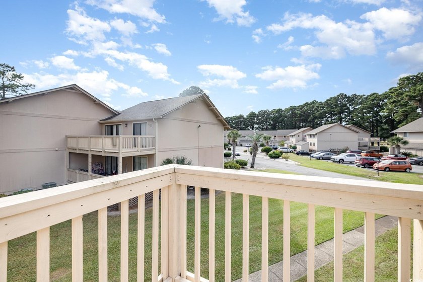 Welcome to this charming two-bedroom, two-bathroom end-unit - photo 30