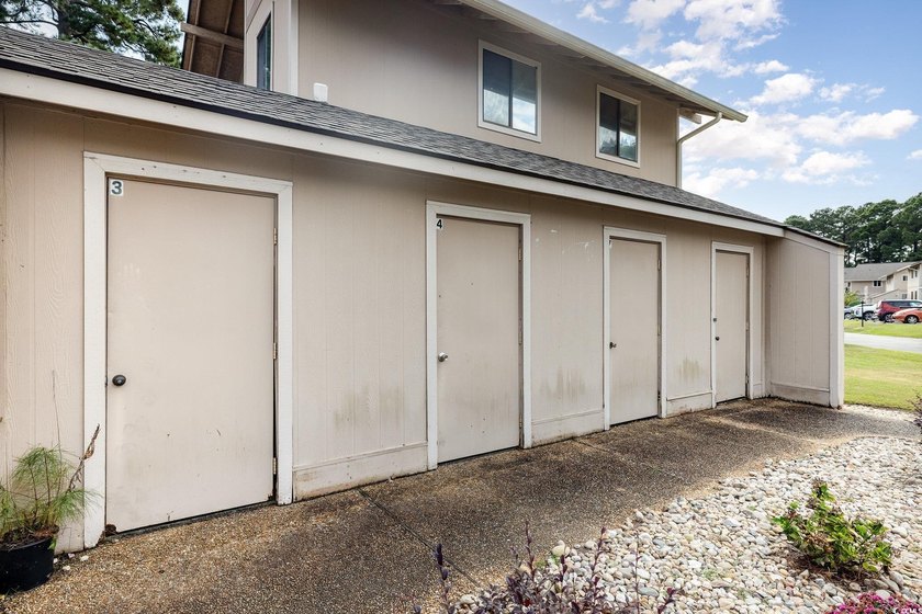 Welcome to this charming two-bedroom, two-bathroom end-unit - photo 31