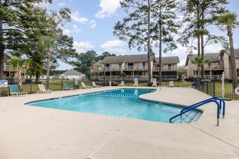 Welcome to this charming two-bedroom, two-bathroom end-unit - photo 36