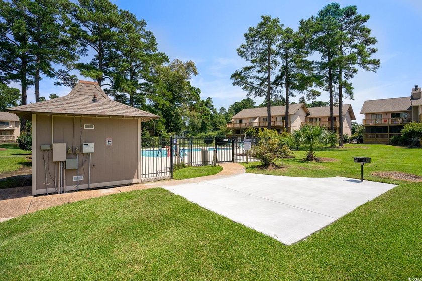Welcome to this charming two-bedroom, two-bathroom end-unit - photo 37