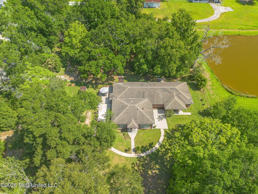 Nestled in a picturesque, park-like setting, this spacious 3,297 - photo 6