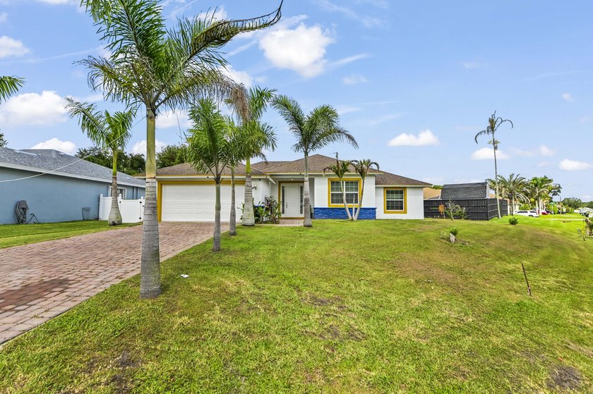 Welcome to this beautiful Port St. Lucie 4 bedrooms and 2 - photo 2