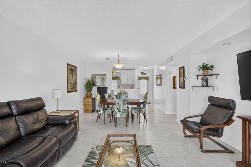Beautifully updated 2-bedroom, 2-bath first-floor corner unit in - photo 9