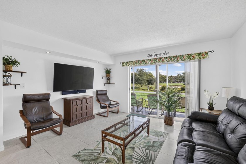 Beautifully updated 2-bedroom, 2-bath first-floor corner unit in - photo 10