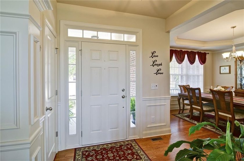 Experience luxury lake living at its finest in this exceptional - photo 3