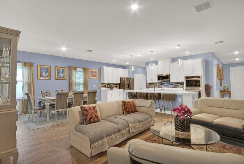 This stunning home features a bright, open-concept design - photo 5