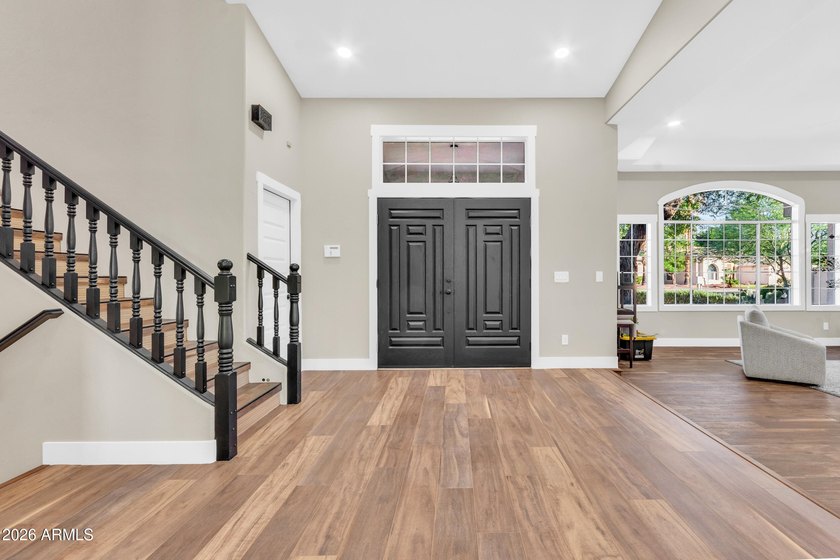 Welcome Home: Lakefront Luxury Awaits Step into a home where - photo 6