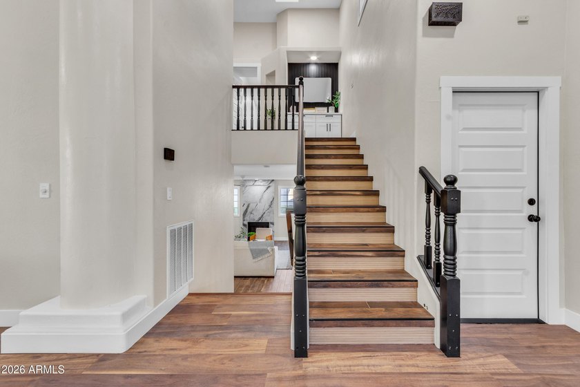 Welcome Home: Lakefront Luxury Awaits Step into a home where - photo 7