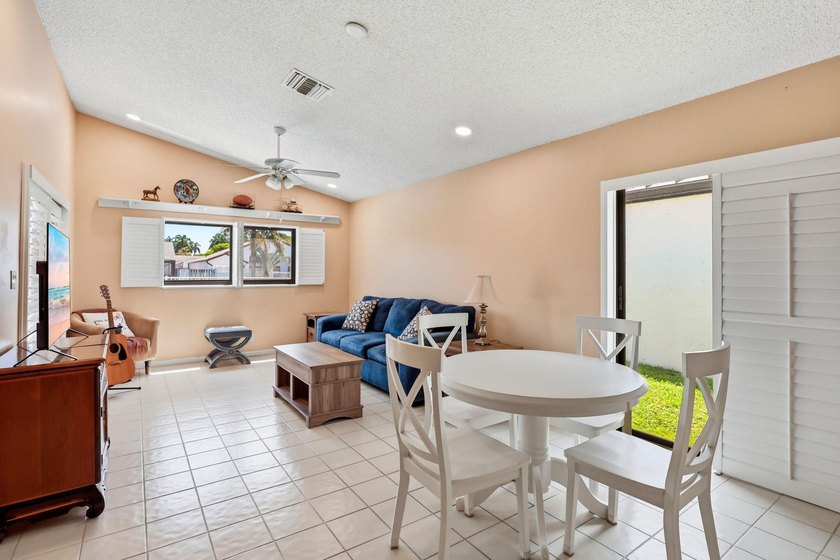 Welcome to this exceptional single-story waterfront residence - photo 7