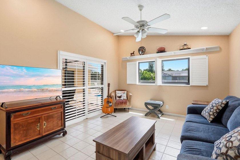 Welcome to this exceptional single-story waterfront residence - photo 8