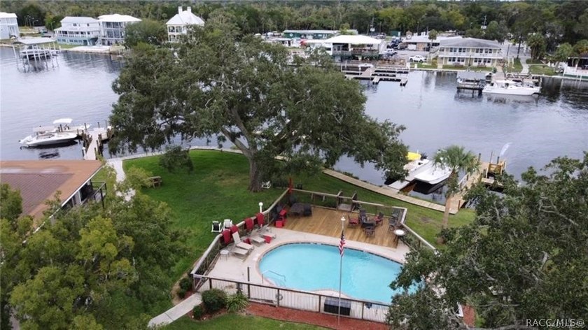 Enjoy true waterfront living-without the maintenance headaches - photo 5