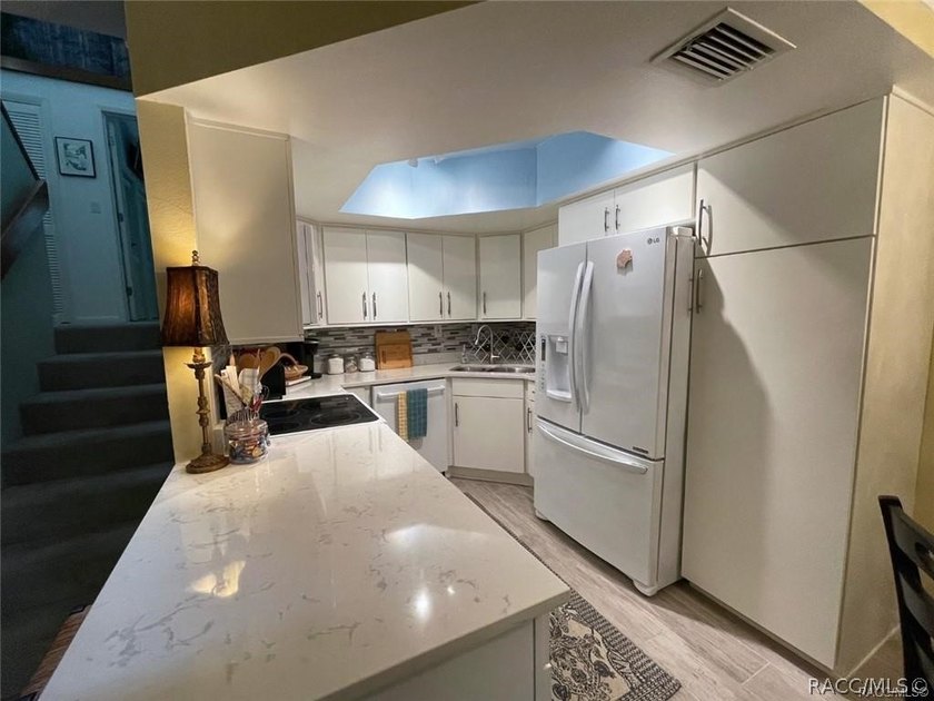 Enjoy true waterfront living-without the maintenance headaches - photo 10