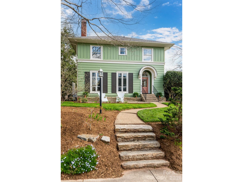 There is a warm, inviting grace to this Grove Park home that - photo 2