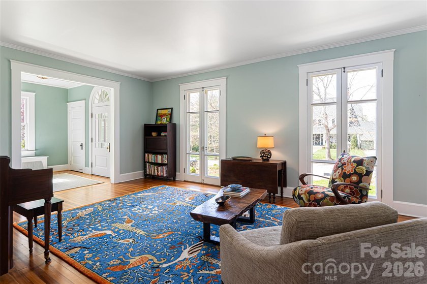 There is a warm, inviting grace to this Grove Park home that - photo 4