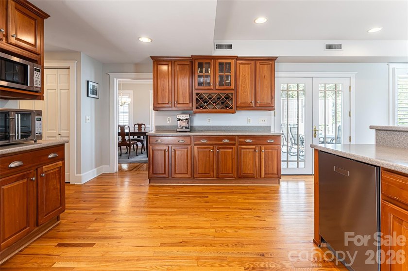 There is a warm, inviting grace to this Grove Park home that - photo 9