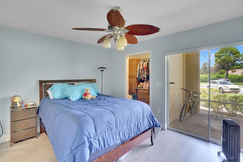 Welcome to this inviting first-floor condo in a gated community - photo 12