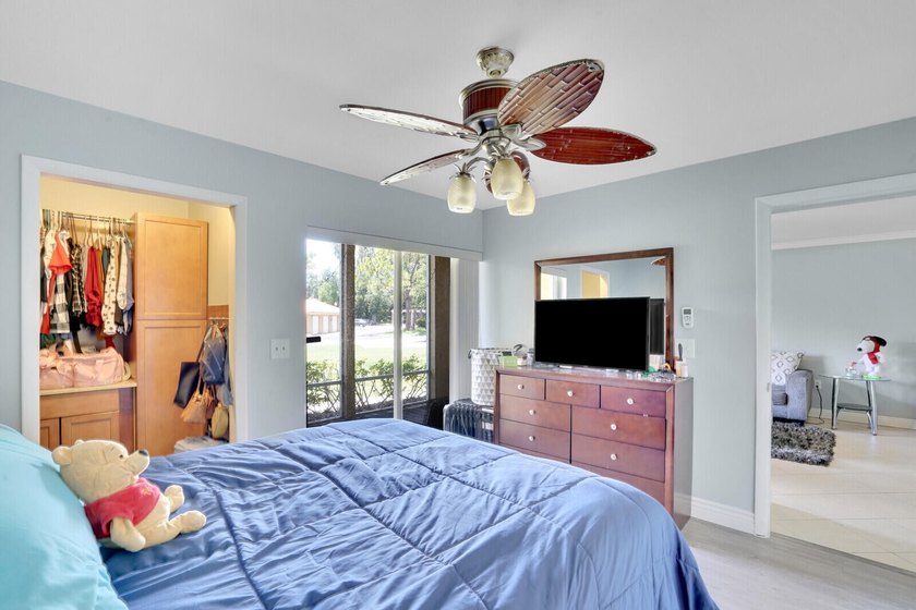 Welcome to this inviting first-floor condo in a gated community - photo 13