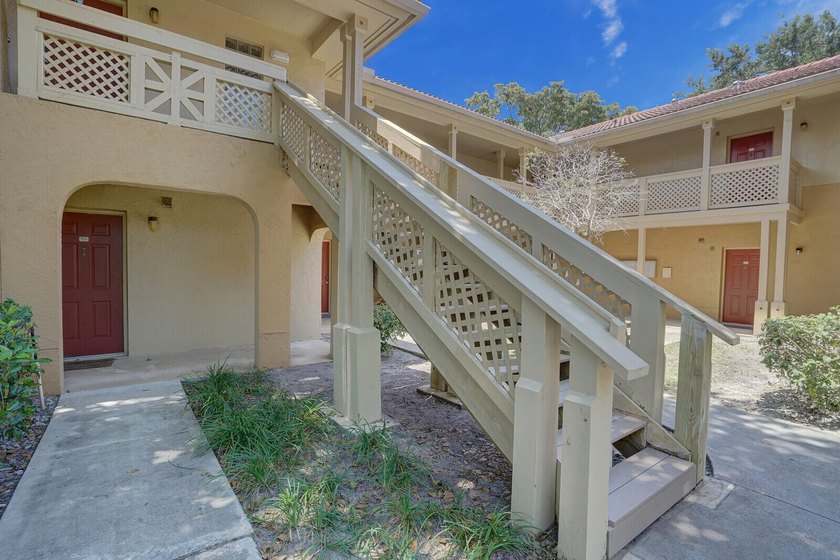 Welcome to this inviting first-floor condo in a gated community - photo 22