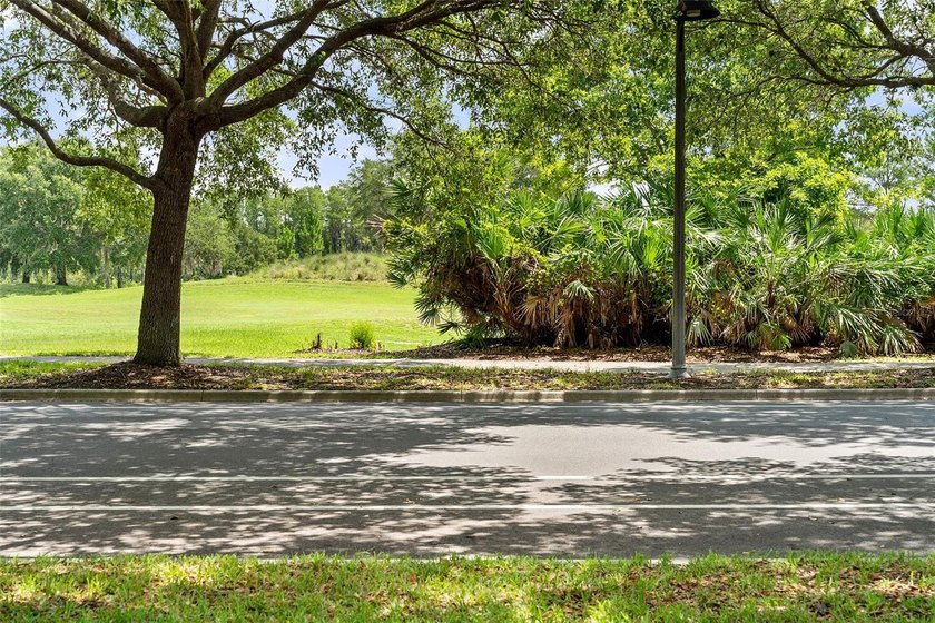 You will fall in love with the golf course views from the front - photo 3