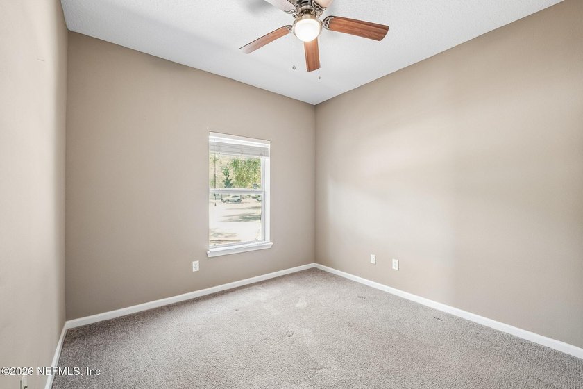 Welcome to this beautifully maintained 3-bedroom, 2-bath condo - photo 24
