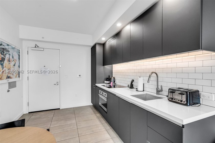 Turnkey 1-bedroom, 1-bath residence at YOTELPAD Miami in the - photo 12