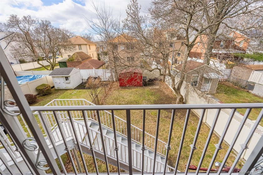Excellent opportunity to own a well-maintained two-family home - photo 14