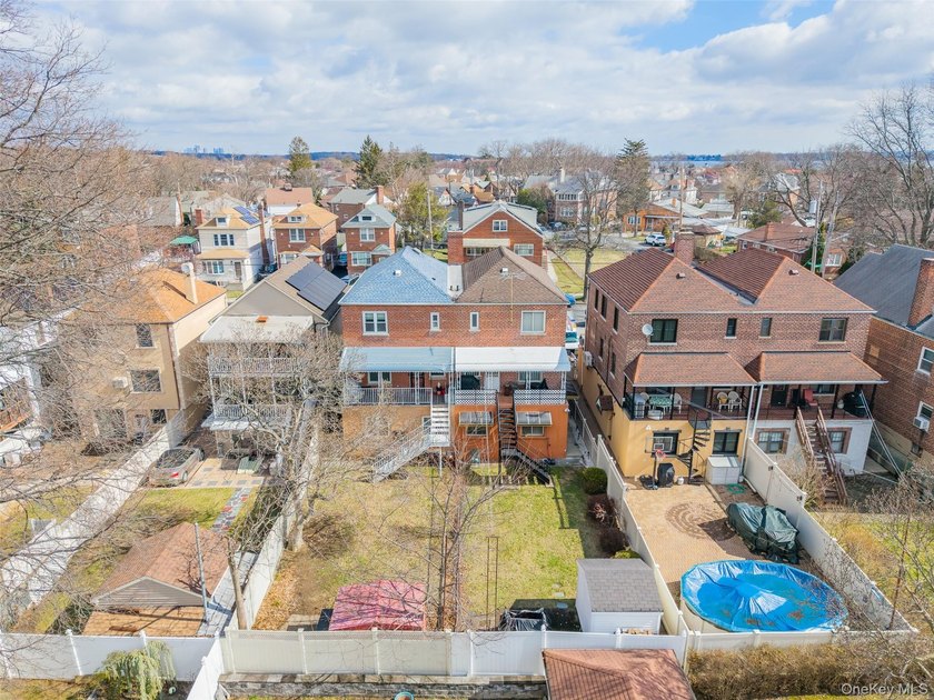 Excellent opportunity to own a well-maintained two-family home - photo 36