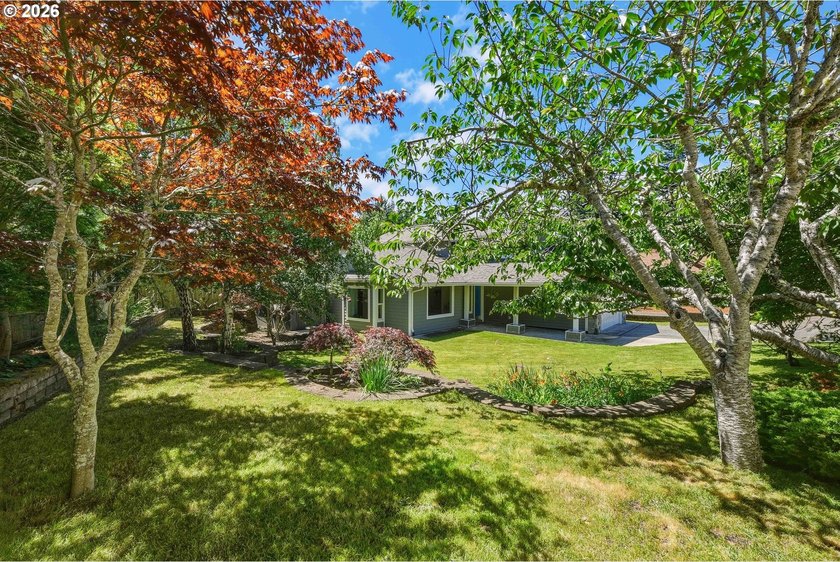 Beautifully updated and move-in ready, this 4-bedroom, 3-bath - photo 2
