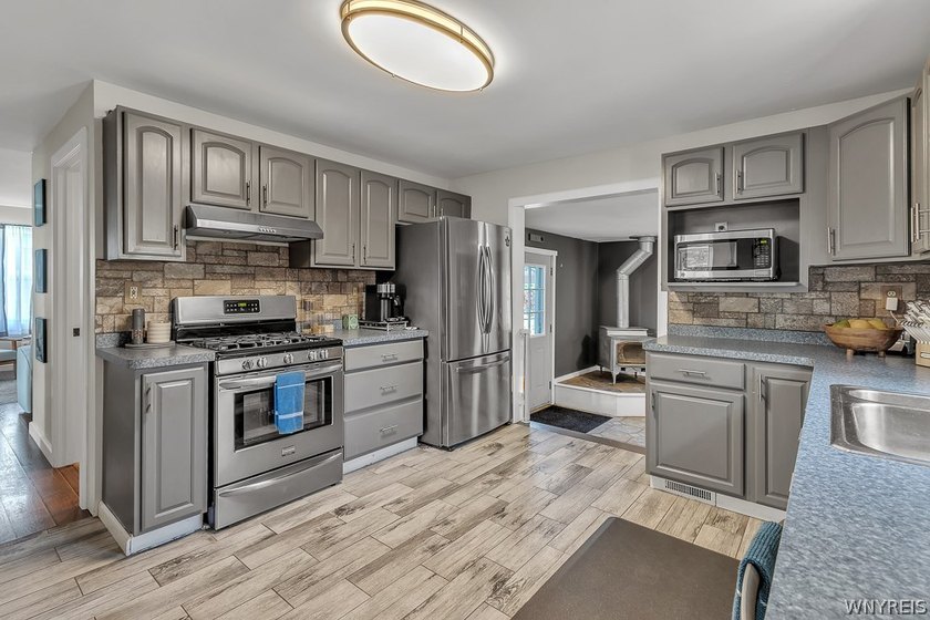 Welcome home to 212 East Ave! This inviting two-story home sits - photo 17