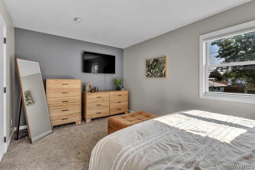 Welcome home to 212 East Ave! This inviting two-story home sits - photo 22