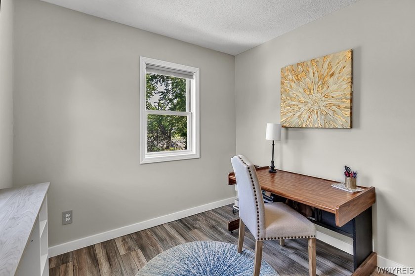 Welcome home to 212 East Ave! This inviting two-story home sits - photo 26