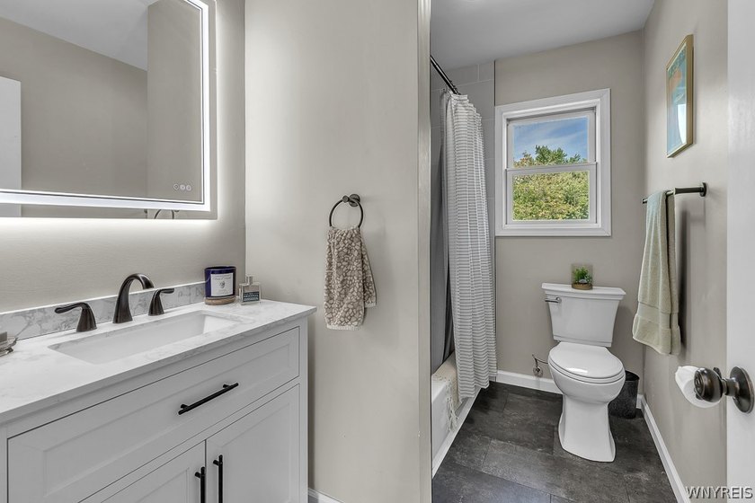 Welcome home to 212 East Ave! This inviting two-story home sits - photo 27