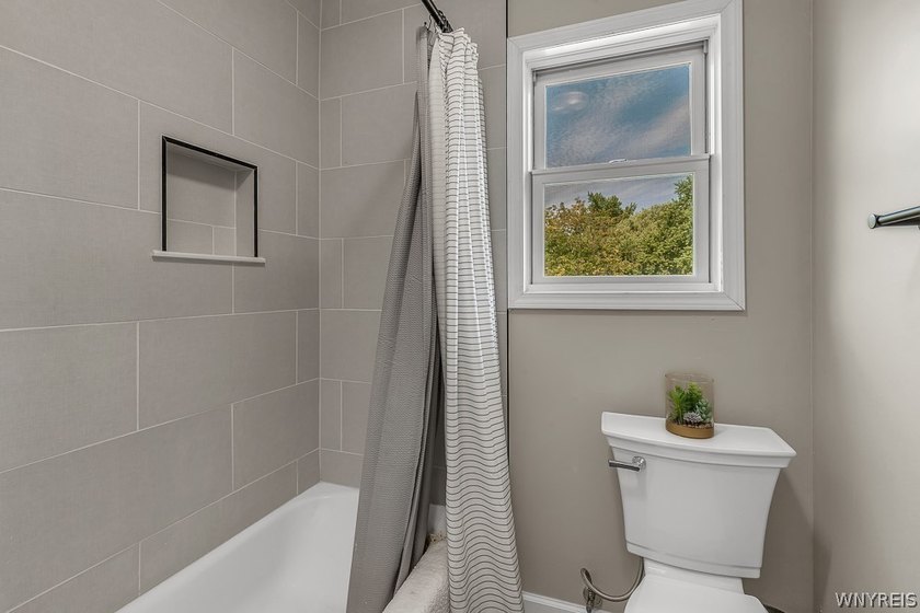 Welcome home to 212 East Ave! This inviting two-story home sits - photo 28