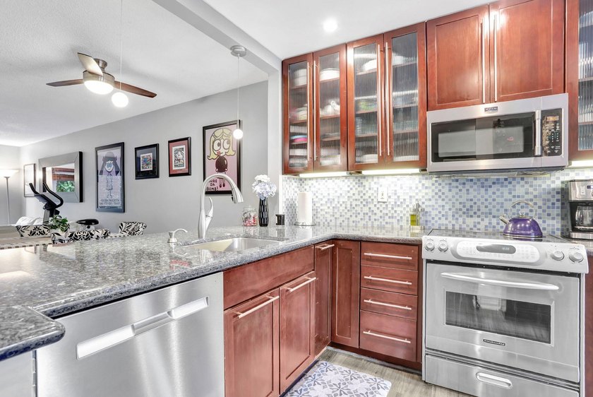 Move-in ready and thoughtfully updated, this charming 2-bed - photo 9