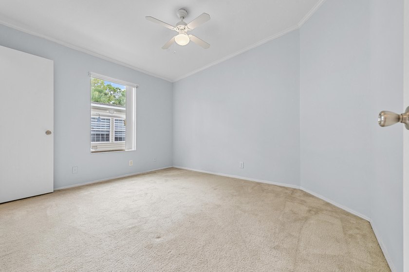 Welcome to this charming 3-bedroom, 2-bathroom waterfront home - photo 26