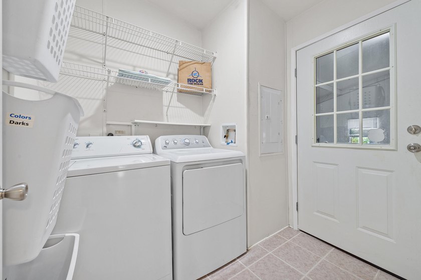 Welcome to this charming 3-bedroom, 2-bathroom waterfront home - photo 31