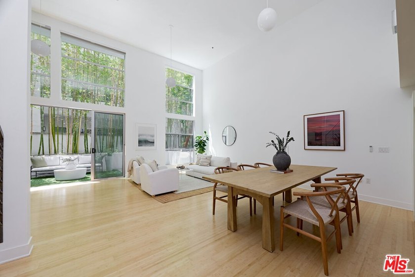 Experience elevated coastal living in this stunning - photo 2