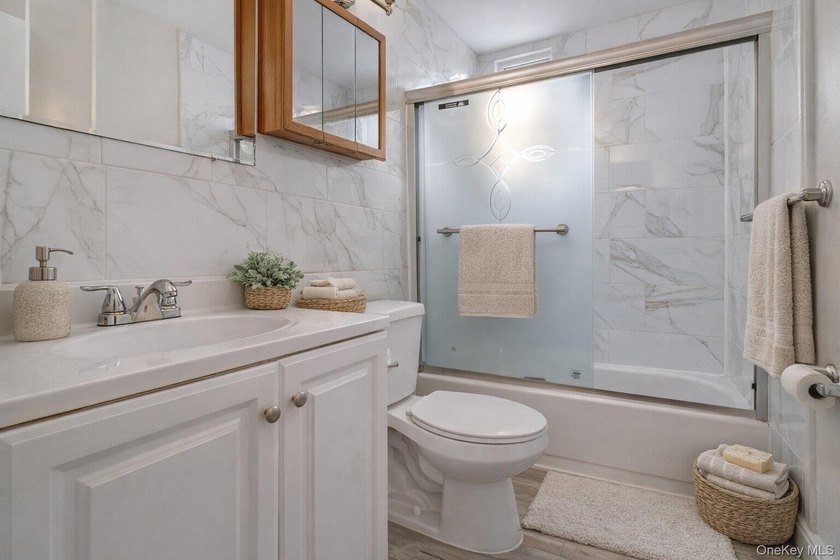 New to the market, this move-in ready two-family Brick property - photo 11