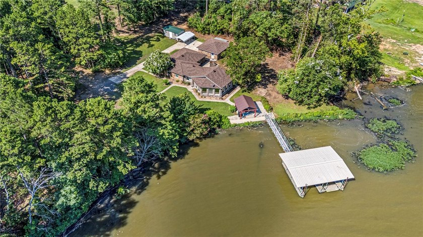 Tucked away along the shoreline of Lake Dardanelle, this - photo 44