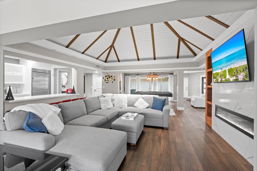 Completely remodeled and designed for luxury living, this - photo 5