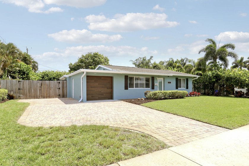 Completely remodeled 3-bedroom, 2-bath home in North Palm Beach! - photo 3