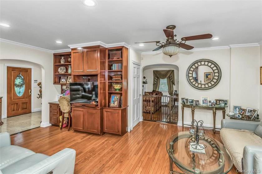 Set on a manicured corner lot in Bayside, this expanded Colonial - photo 13