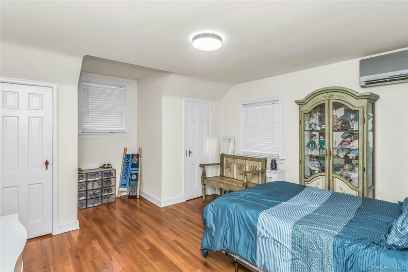 Set on a manicured corner lot in Bayside, this expanded Colonial - photo 21