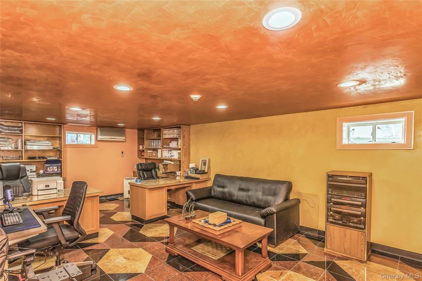 Set on a manicured corner lot in Bayside, this expanded Colonial - photo 25