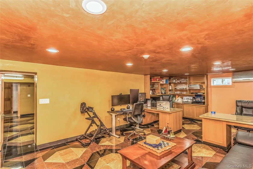 Set on a manicured corner lot in Bayside, this expanded Colonial - photo 26